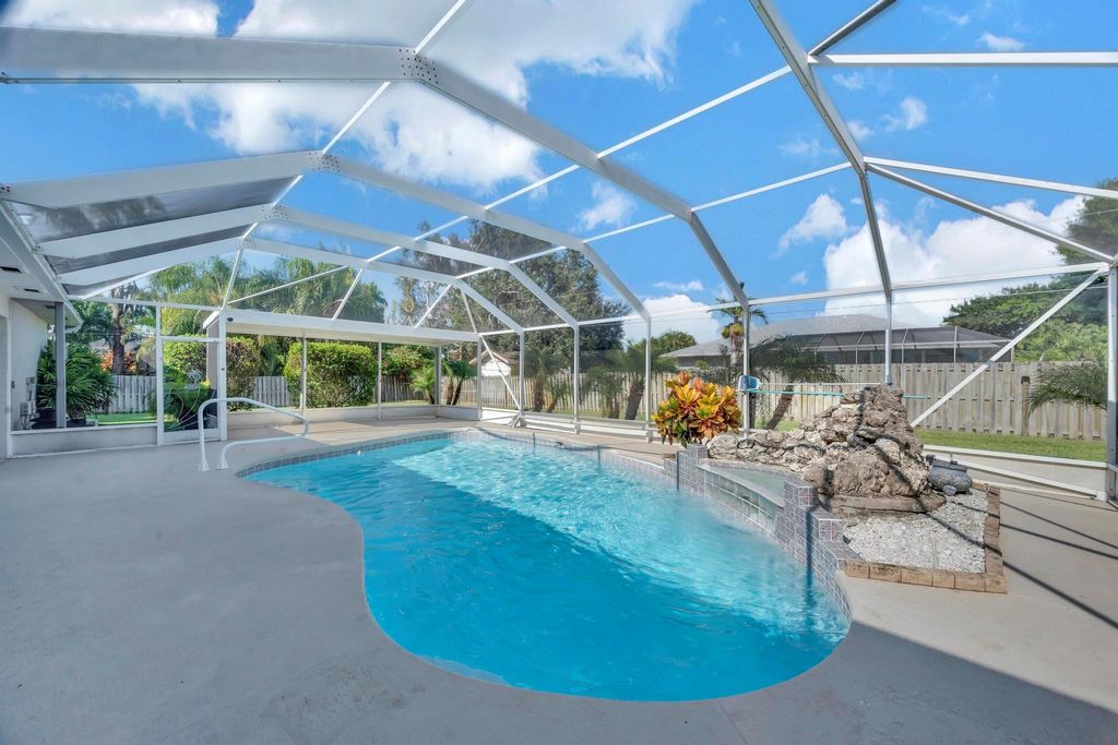 Photo of 2013 SE Hanford Road, Port Saint Lucie, FL 34952 (MLS # R11112456)