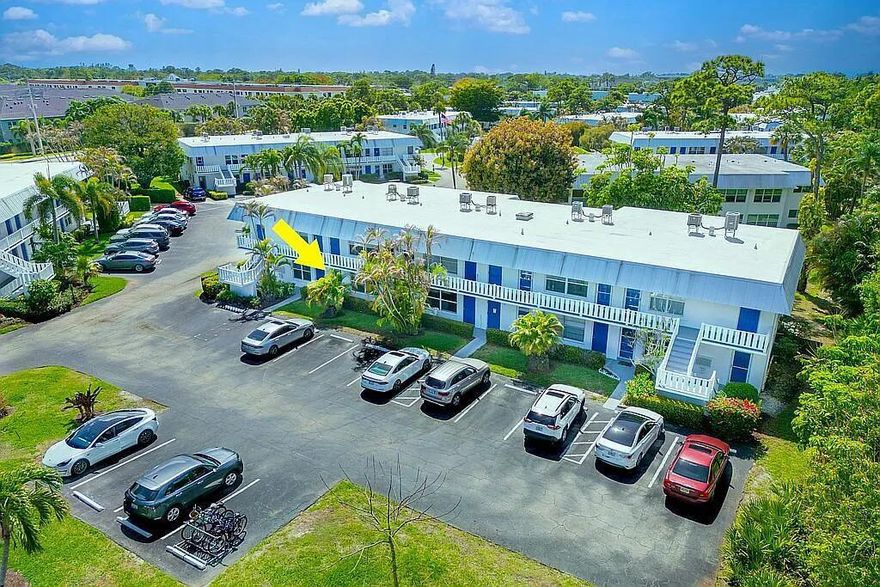 Highly sought after BOTTOM Floor Condo -Fully RENOVATED 2 Bedrooms / 1.5 Bath  UPDATES INCLUDE: New Non-slip Porcelain Tile, Soft-close Kitchen Cabinets, Under Cabinet LED lighting, 8.5ft Quartz Countertop Bar, New Stainless Steel Appliances, Recessed Lighting, New Entry Doors, New Impact Front Windows, Custom Tile Shower, New Soft-close Vanities, Solid-core Interior Doors, Brushed Gold Hardware, Remote Ceiling Fans, Custom Closet Shelving + Water Heater 2023, Strong HVAC Unit 2017 Reconditioned, Both Stacks to upper unit updated to PVC in 2017, Tub valves and drain replaced 2025  HOA INCLUDES: Water, Sewer, Cable TV, Fiber Internet, Community Pools, Grills, Clubhouses, Bike Rack, Landscaping, Trash Service, Pest Control Service, Building insurance / maintenance, Storage Room.  (Electric is separate from FPL around 70/month.) Parking spot directly in front of entry door.