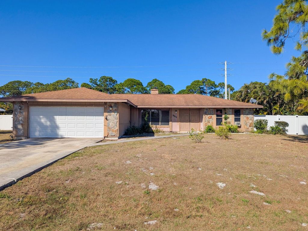 Photo of 5511 Paleo Pines Circle, Fort Pierce, FL 34951 (MLS # R11157556)