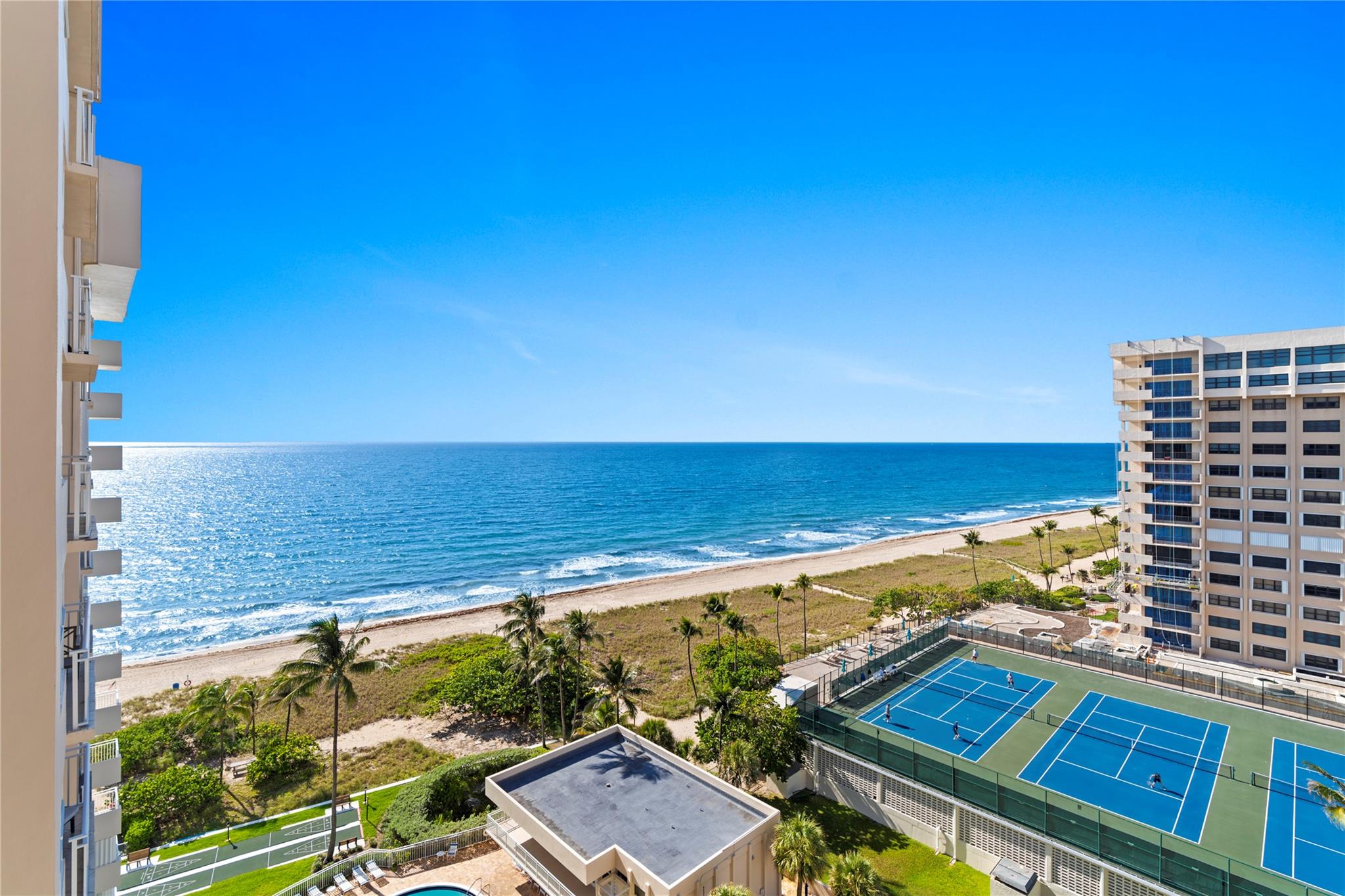 ENJOY DIRECT OCEAN VIEWS FROM EVERY ROOM! A great opportunity to own a piece of paradise. Prime beachfront location, Sun-filled southern exposure, and the potential to make it your own! This light and bright unit offers: 2 spacious Bedrooms and 2 spacious Bathrooms, hurricane impact windows and doors, washer & dryer in the unit, assigned covered parking spot. Sea Ranch Lakes North Building is Professionally managed and offers: Doorman 24hrs, oceanfront living, beautiful tropical landscaped surroundings, pool, BBQ area, fitness center, sauna, card room, clubhouse with full kitchen, and holds great reserves. It Is walking distance to the Publix shopping centers and downtown Lauderdale-by-the-Sea. 25 minutes to Fort Lauderdale airport.