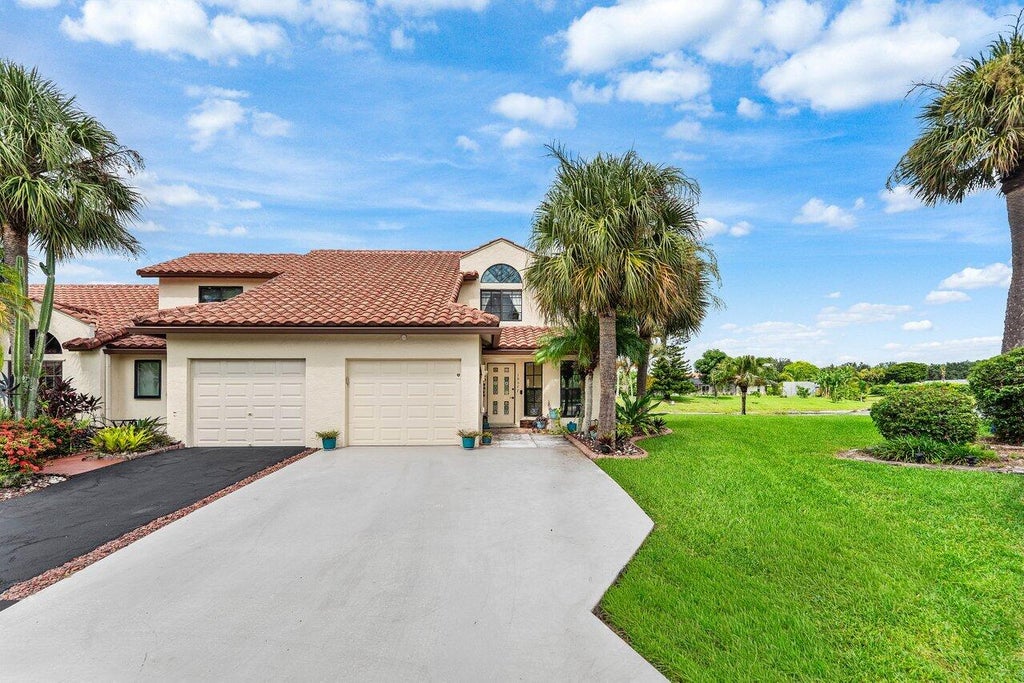 Photo of 18577 Woodstream Drive, Boca Raton, FL 33498 (MLS # B26063103)