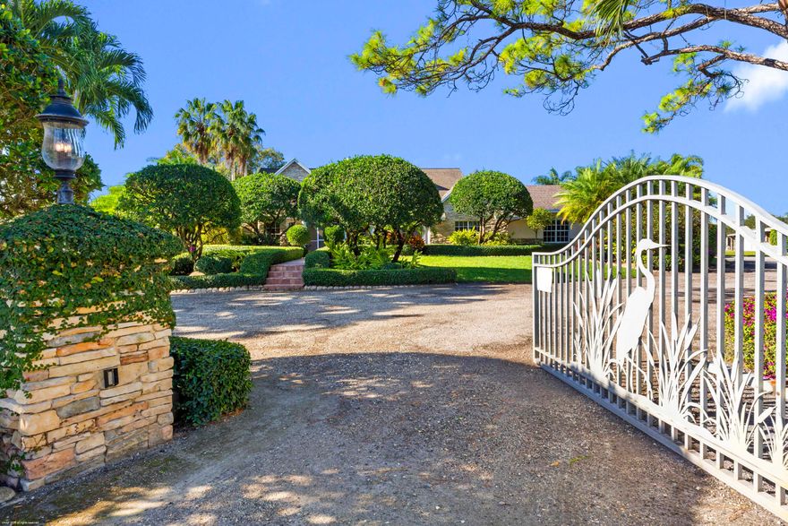 Set on five pristinely manicured, fully irrigated acres in a prime location. This 3-bedroom, 2.5-bath residence offers an exceptional blend of privacy, space, and opportunity. The impeccably well-built and well-maintained home features a huge bonus room/gym, a dedicated office, an updated pool with a new screen enclosure and deck, and an added oversized garage. Fully electric gates and a security system provide peace of mind, while lush landscaping surrounds the property. The entire estate is enclosed by Clusia hedges and mature oak trees, creating a peaceful serene retreat.
Whether you envision building out the farm of your dreams or simply enjoying acres of beautiful green space, this rare offering delivers both lifestyle and long-term value - a true must-see.
DISCLAIMER: All information provided to you regarding this Property by listing agent and her associates has been obtained from third parties such as the Multiple Listing Service, public records and other sources. All Buyers should independently verify all information provided regarding this Property. The Seller, listing agent and broker make no representation as to the accuracy of this information. The Seller, Realtor and Listing broker make no representation as to the accuracy of this information.