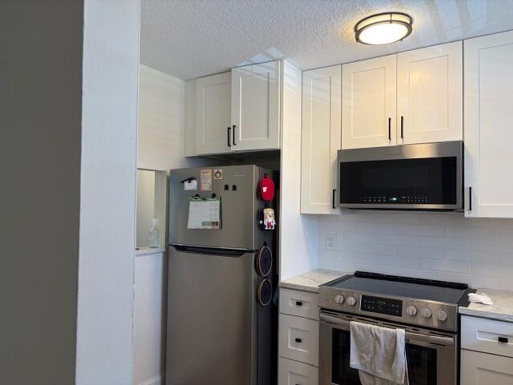 Photo of 21906 Lake Forest Circle, Boca Raton, FL 33433 (MLS # B26020648)