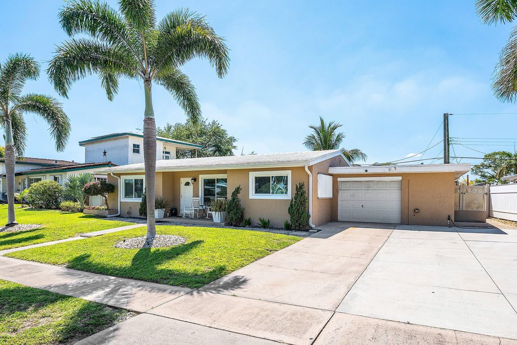 Photo of 1603 Crest Drive, Lake Worth, FL 33461 (MLS # B26007118)