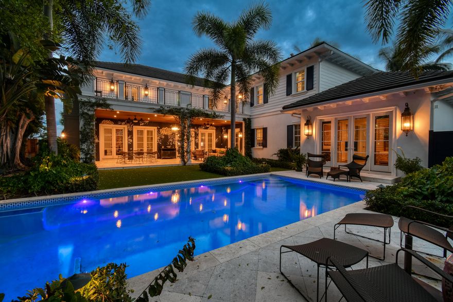 This custom built 2017 home was designed by Caroline Forrest and MP Design and Architecture and built by Courchene Builders. Located in the South Olive Elementary School district, Russlyn Drive is a quiet cul-de-sac located 7 blocks south of Southern with a deeded path to the Flagler Drive promenade. 
The layout is unique. 
The plan was conceived for those who love to cook, entertain, and work.  The core of the home is the huge gourmet kitchen open to a dining area for 8, which is open to the Great room. Off this central hub is a large outdoor loggia living and dining area, overlooking the pool and the large, lush yard designed by Fernando Wong Outdoor Living Design. 

The first floor has a large and comfortable media room off the foyer and a multi-person office. The home features 5 large bedrooms and 5 and a half baths. All the Bed/Baths are ensuite, each with gracious closet space. The extra-large primary suite features dual walk-in closets and an amazing primary bath and private terrace... The four 2nd floor bedrooms are separated by hallways leading different directions affording the occupants convenient proximity, yet privacy as well. 

The second floor also has a large work loft which can be used as the new owners see fit. The storage never ceases to amaze including an over-sized 2-car garage, mud/laundry room, walk-in pantry, and linen and storage closets throughout the house.

No expense was spared in the material, quality, and construction detail, including a poured concrete 2nd story, impact windows and doors, clipped and strapped down cement tile roof, Icynene insulation, 2 tankless water heaters, complete house filtration and irrigations systems, central vac, and a Pyng lo-voltage control system with speakers throughout.  Additionally, the house features a full house Kohler generator, a built-in EV outlet and a 140+bottle wine refrigerator.

This is an opportunity not to be missed.