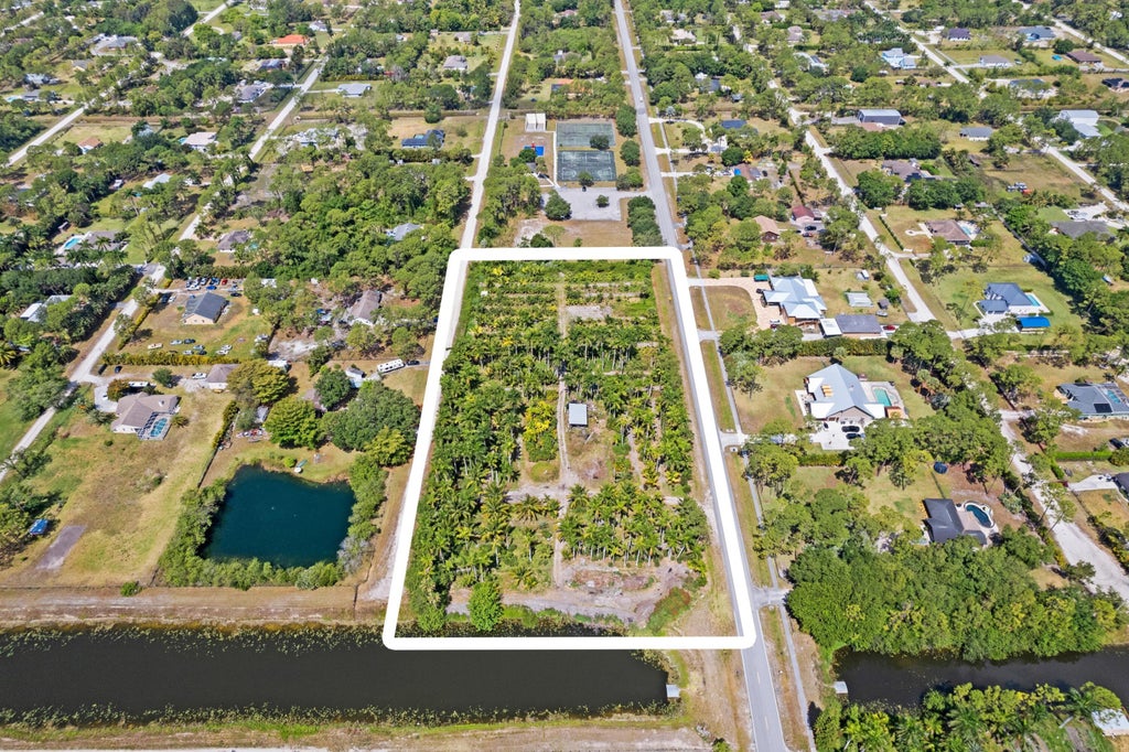 Photo of Xxxx Xxxx Temple Boulevard, Loxahatchee, FL 33470 (MLS # R10985562)