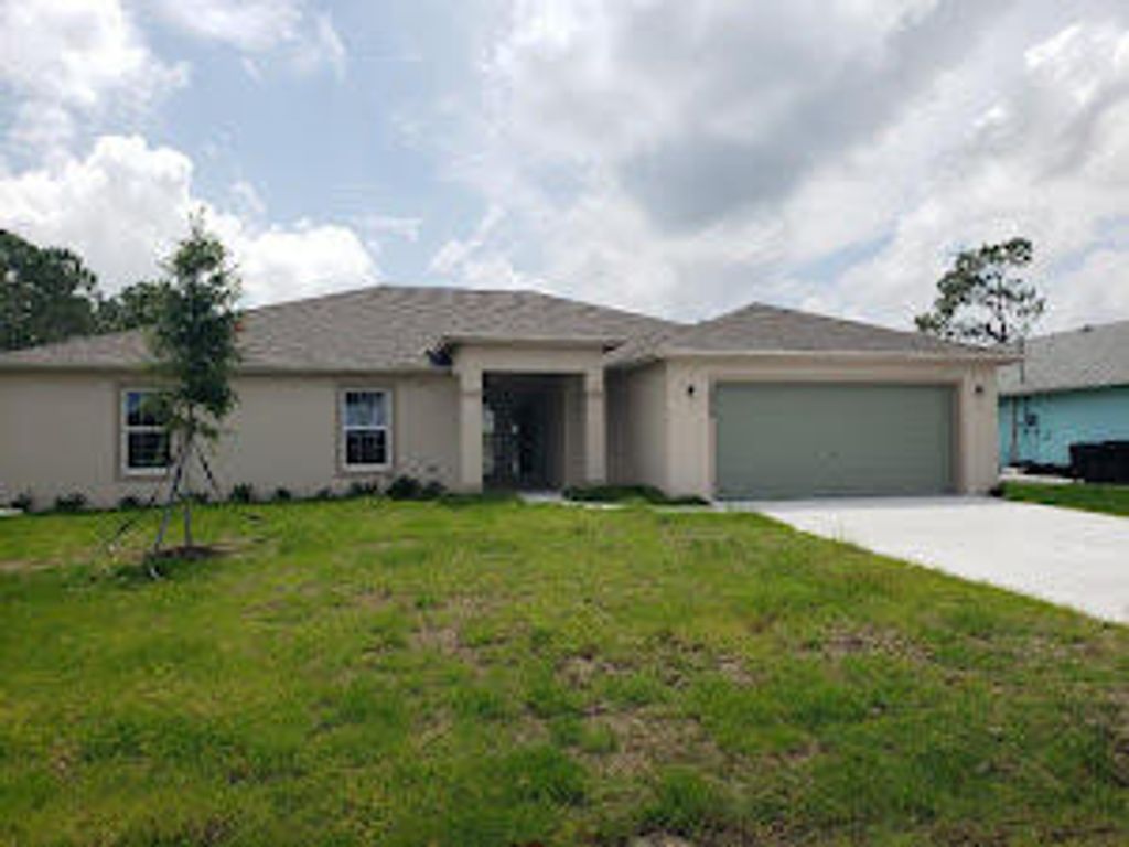 Photo of 1510 SW Underwood Avenue, Port Saint Lucie, FL 34953 (MLS # R11065836)