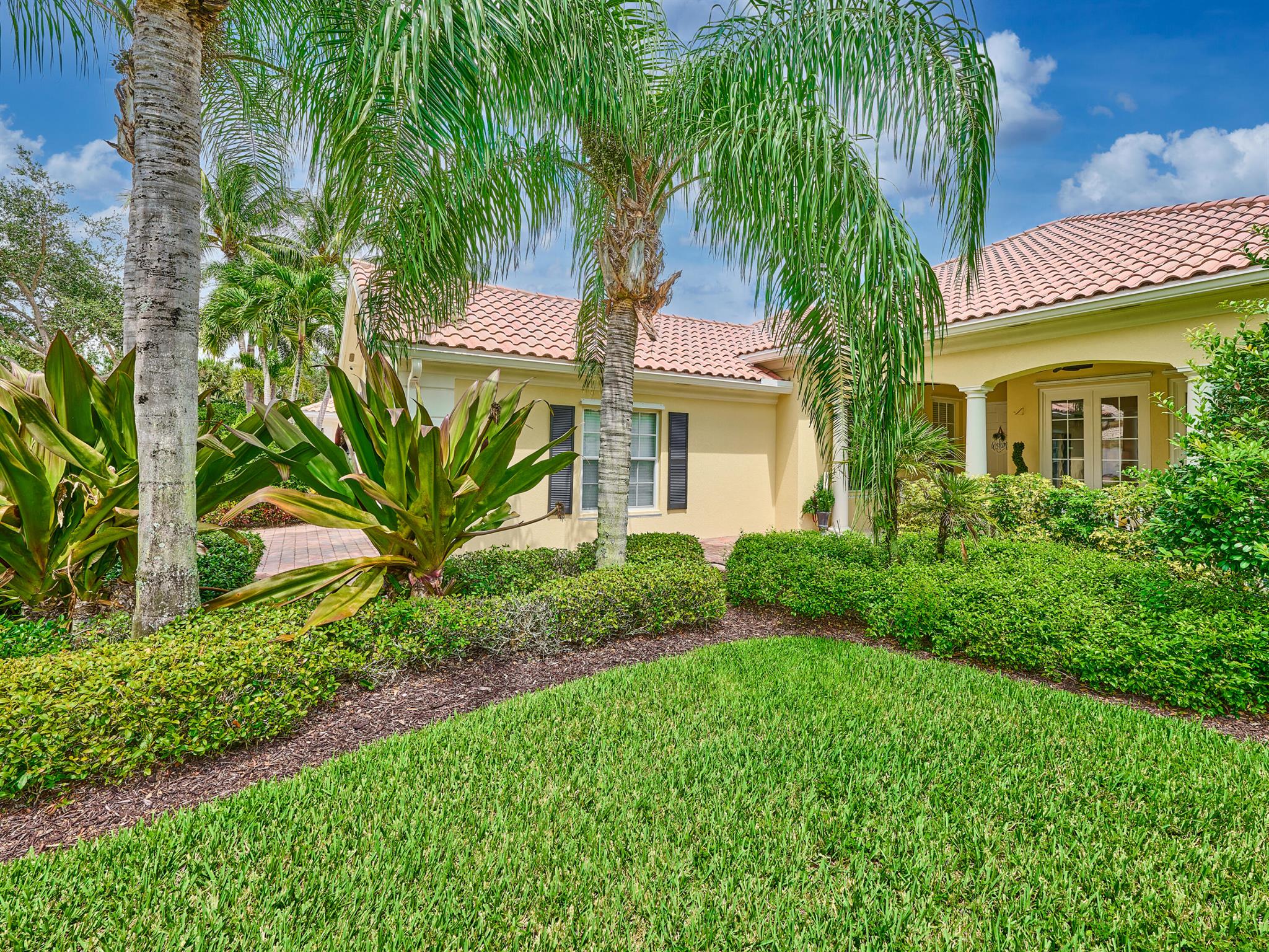 Mint fully renovated Ranch style home in Village Walk. Seconds from Polo Grounds, shopping & restaurants. Private pool with canal views. Master bath has 2 toilets, Fully furnished, tons of natural light, fireplace, floor to ceiling windows. Adorable front porch. Clubhouse, gym, pool & more. Room for everyone.