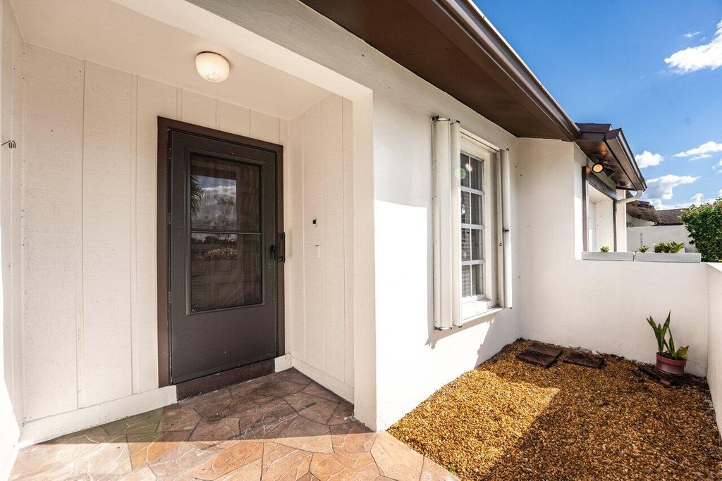 Photo of 15640 Bottlebrush Circle, Delray Beach, FL 33484 (MLS # R11157492)