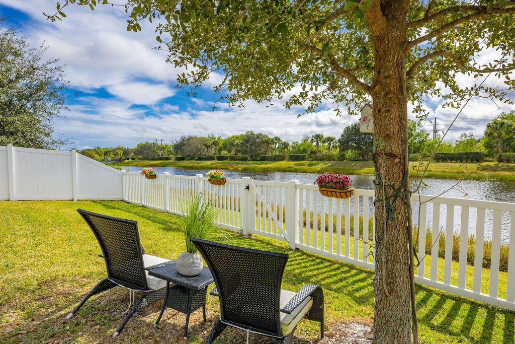 Photo of 5580 NW Pine Trail Circle, Port Saint Lucie, FL 34983 (MLS # B26024066)