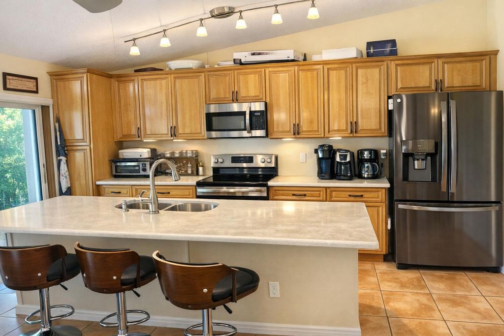 Photo of 6529 Las Palmas Way, Port Saint Lucie, FL 34952 (MLS # B26017142)