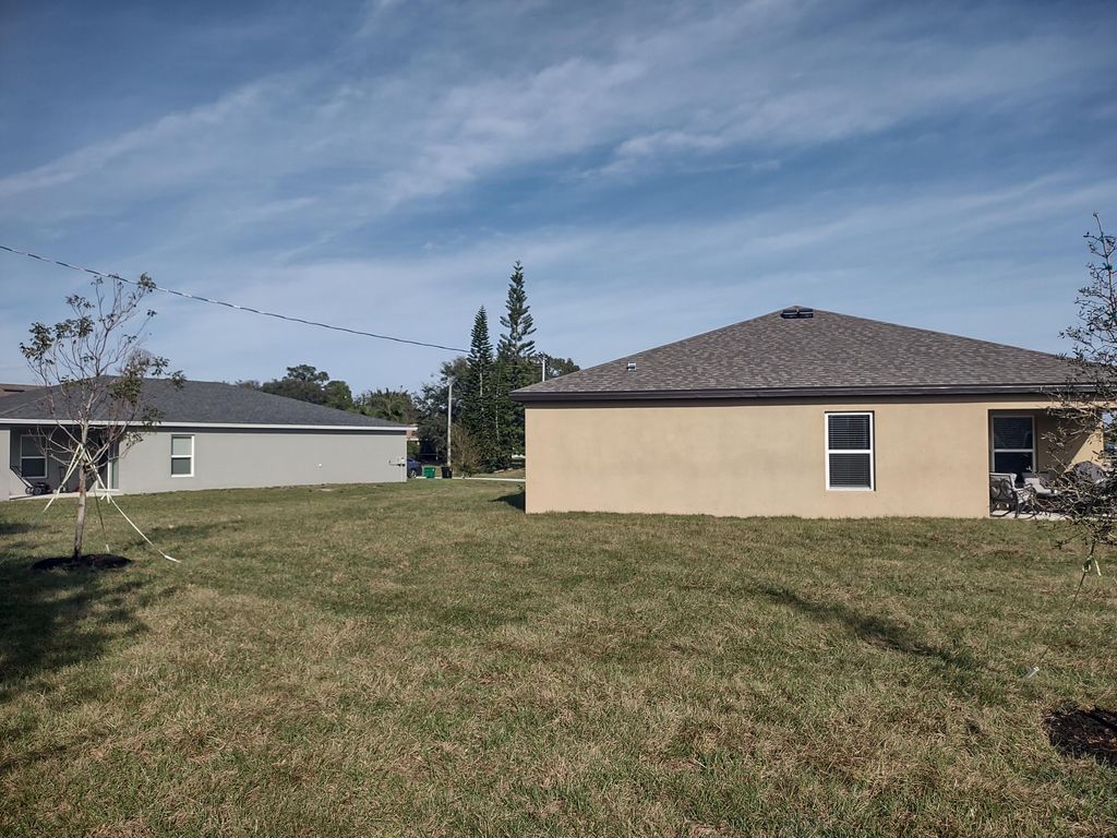 Photo of 2743 SW Rosser Boulevard, Port Saint Lucie, FL 34953 (MLS # R10952272)