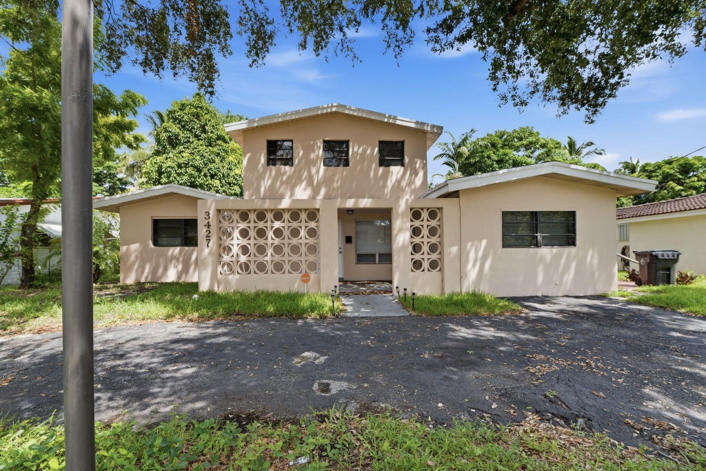 Photo of 3427 NW 37TH Street, Lauderdale Lakes, FL 33309 (MLS # B26074618)
