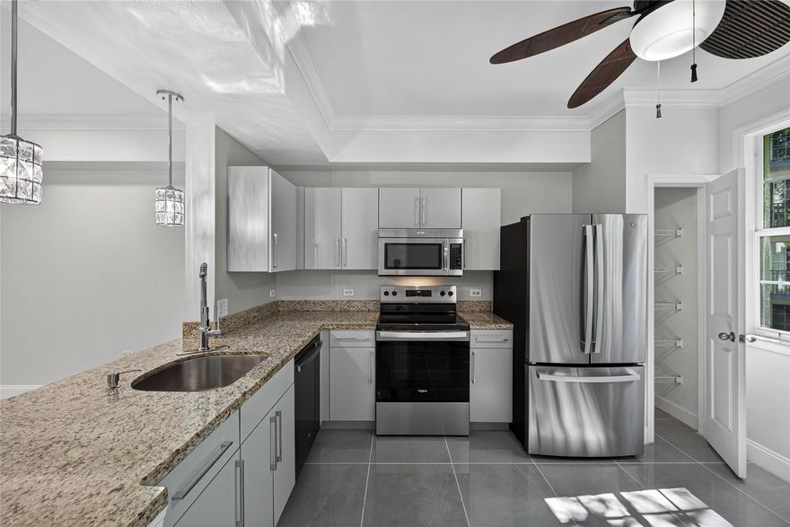 Welcome home to one of the largest one-bedroom plus den floor plans at Sole, a contemporary and sought-after community just steps from vibrant Flagler Village. Enjoy easy access to the area’s best new restaurants, shops, FAT Village art scene, Las Olas, coffee spots, and nightlife! This beautifully upgraded condo features an open-concept kitchen, modern finishes, and thoughtful details throughout. Relax with tranquil views of the lush secret garden and  waterfall. Enjoy the convenience of an in-unit washer and dryer, and an impressive list of amenities, including a fitness center, resort-style pool, conference room, on-site management, security, internet, water, and trash, included in your association fee. Pet-friendly community. Move right in and start living the downtown lifestyle.