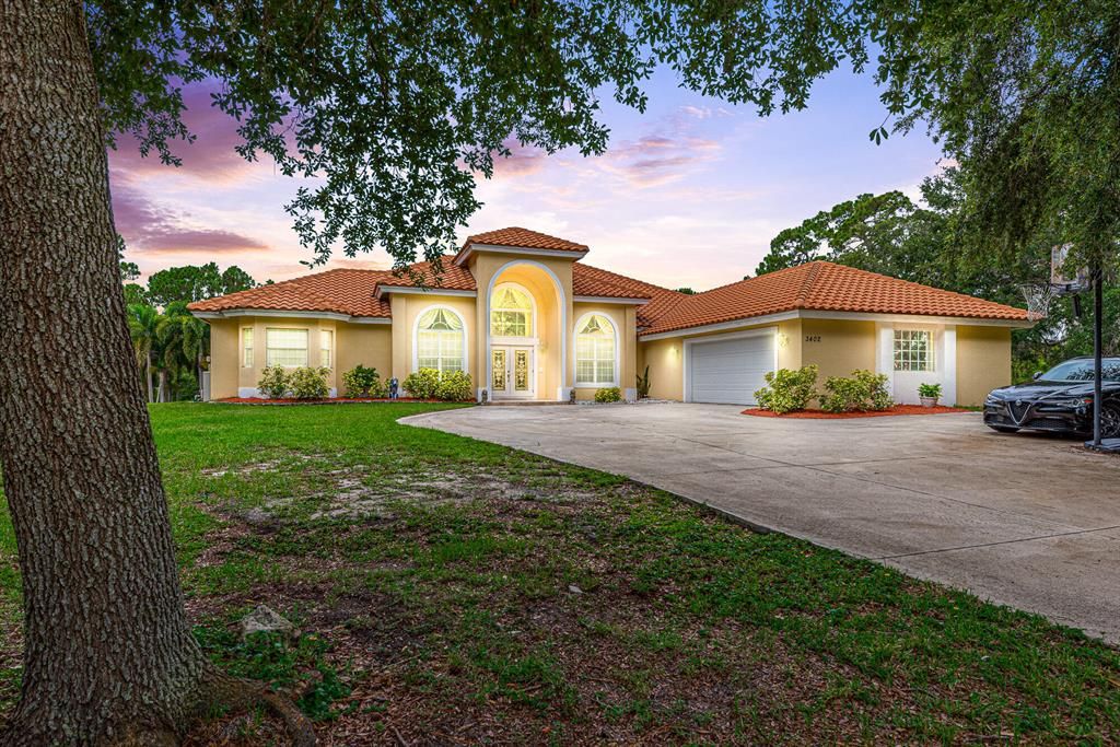 Photo of 3402 SW Holly Lane, Palm City, FL 34990 (MLS # R10725771)