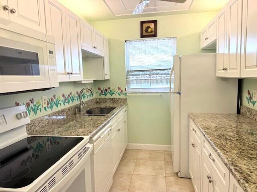 Photo of 624 Pines Knoll Drive #D, Fort Pierce, FL 34982 (MLS # R11165542)