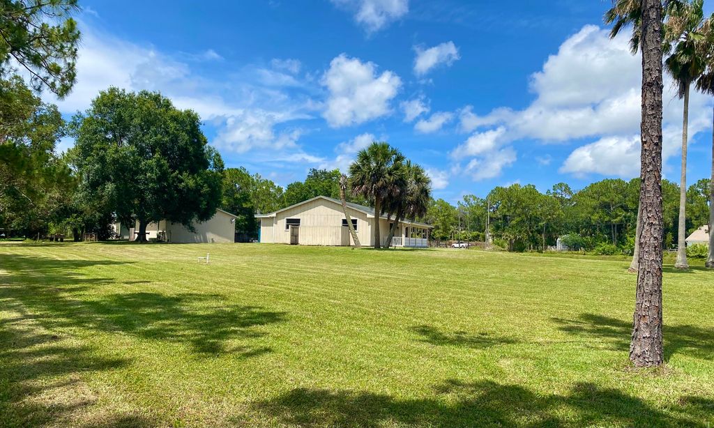 Photo of 10531 151st Lane N, Jupiter, FL 33478 (MLS # B26031956)