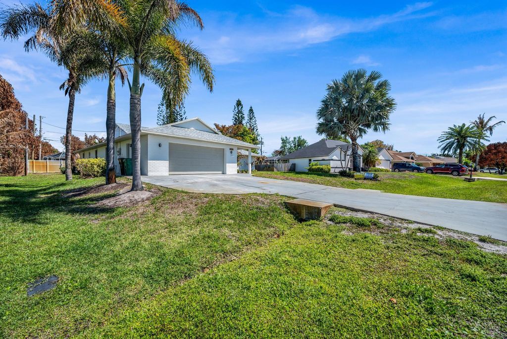 Photo of 3133 SE Card Terrace, Port Saint Lucie, FL 34984 (MLS # B26008451)