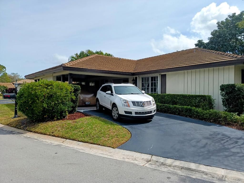 Photo of 496 Forestview Drive, Atlantis, FL 33462 (MLS # R10965239)