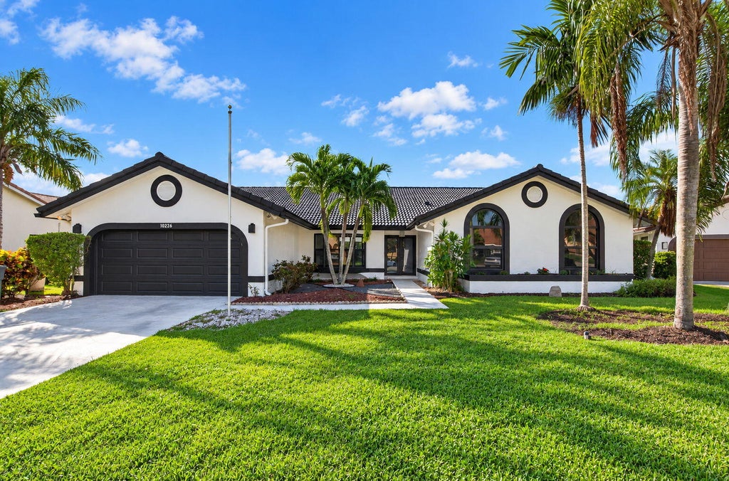 Photo of 10226 FRESH MEADOW Lane, Boca Raton, FL 33498 (MLS # B26085880)