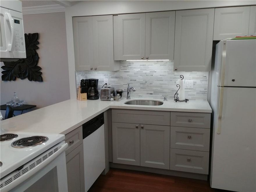 SPACIOUS! TOTALLY RENOVATED! 1/1/.5 IN POPULAR DRAKE TOWER! LOTS OF CLOSET SPACE! LAMINATE FLOORS! OPEN KITCHEN! SPA TUB! ECO SAVING TANKLESS WATER HEATER! CONVENIENT TO 95, AIRPORT, SEAPORT, LAS OLAS, BEACH!! THE "DRIVE"!!  GENEROUS OPEN BALCONY! IMPACT SLIDERS/WINDOWS! MONTHLY INCLUDES...WATER! SEWER! TRASH! U-VERSE PREMIUM CABLE! LAUNDRY! CAR WASH! BBQS! BIKE ROOM! REC ROOM! GATED PARKING! MANAGER ON SITE! HEATED RIVERSIDE POOL! FREE U-VERSE 300 CHANNELS PLUS HBO, STARZ! FREE LAUNDRY! BIG SAVINGS!!