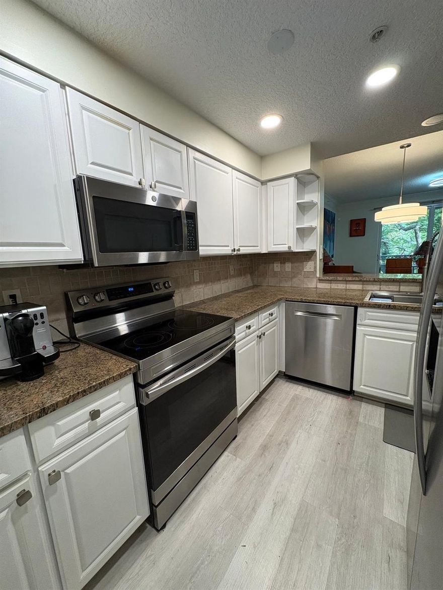 Stunning completely renovated 3 Bedroom Delray Beach Townhouse funrnished and turnkey with waterfront views, private garage, impact windows, stainless steel appliances, and remodeled updates throughout! Located minutes from the beach and all of downtown Delray, this gated community includes extra amenities like a resort style pool, gym, pickelball, playground, basketball & tennis courts. Welcome to paradise.