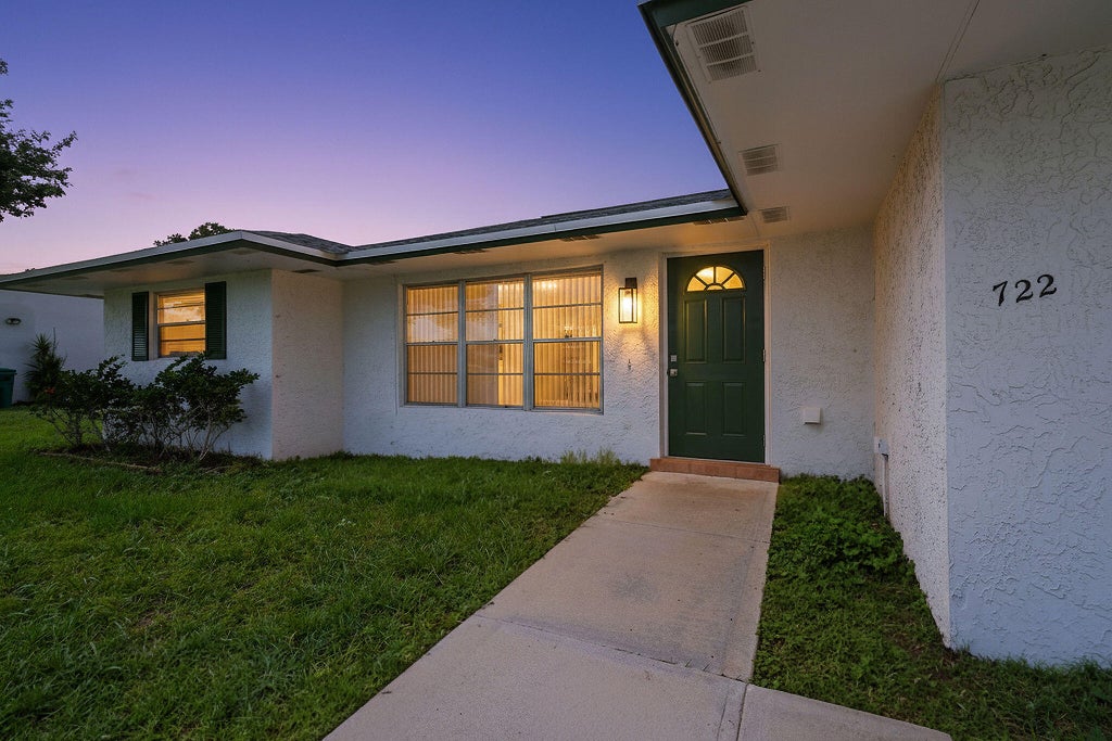 Photo of 722 SE Arton Lane, Port Saint Lucie, FL 34983 (MLS # B26064830)