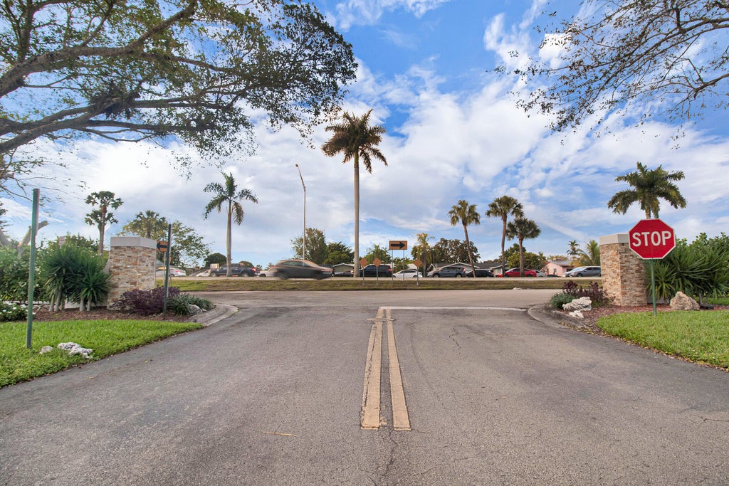 Photo of 6890 ROYAL PALM Boulevard #101H, Margate, FL 33063 (MLS # B26088364)