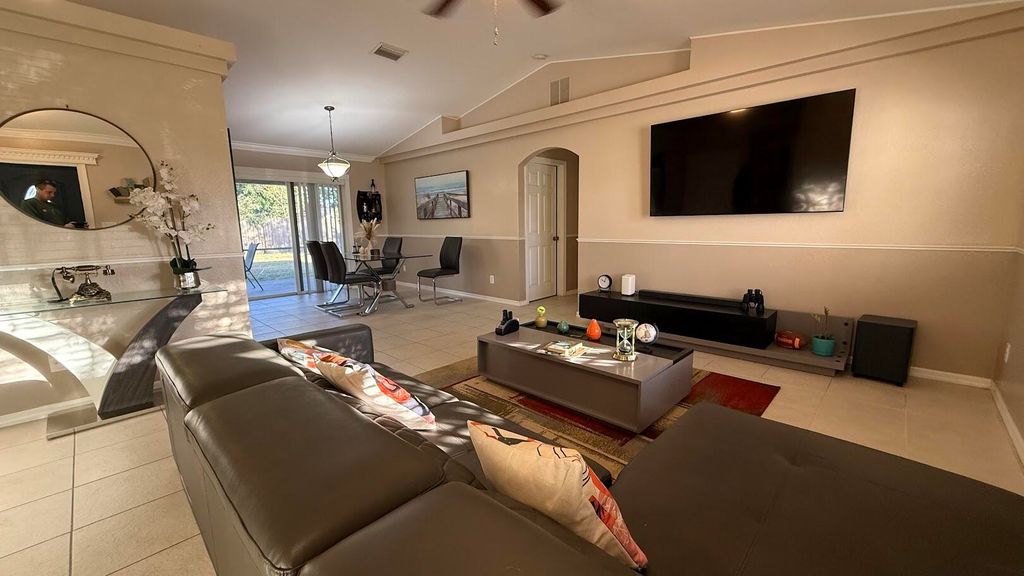 Photo of 3647 SW Ballweg Street, Port Saint Lucie, FL 34953 (MLS # R11160488)