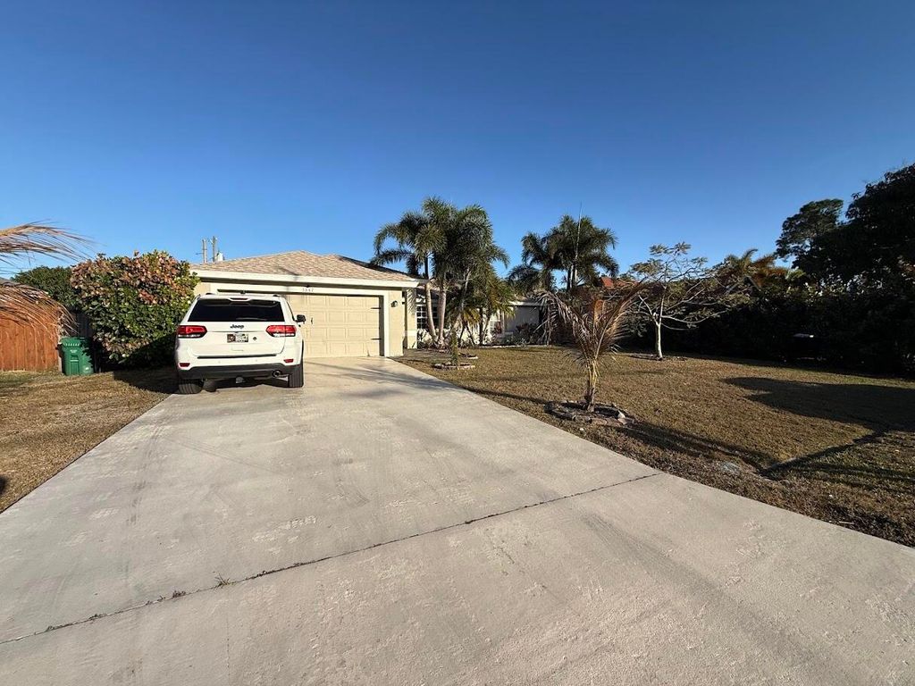 Photo of 3647 SW Ballweg Street, Port Saint Lucie, FL 34953 (MLS # R11160488)