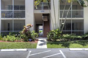 All age welcome building. Located between Polo Trace and Valencia Falls. First Floor, completely renovated condo, new everything, kitchen, floors, bathrooms and appliances. This is definitely a move in condition.. Nice size bedrooms with large windows, ample closets and storage. Two master bedroom closets. Eat in kitchen, screen in patio overlooking Florida landscape. Ample guest parking. Community Pool, walk path around lake.