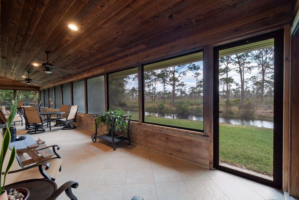 Photo of 8558 SE Sharon Street, Hobe Sound, FL 33455 (MLS # R10960019)