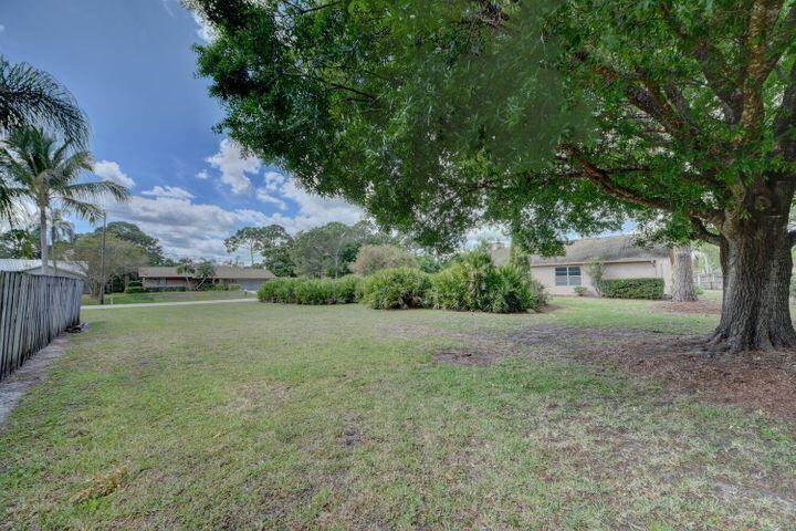 Photo of 201 SW Eyerly Avenue, Port Saint Lucie, FL 34983 (MLS # R10710335)