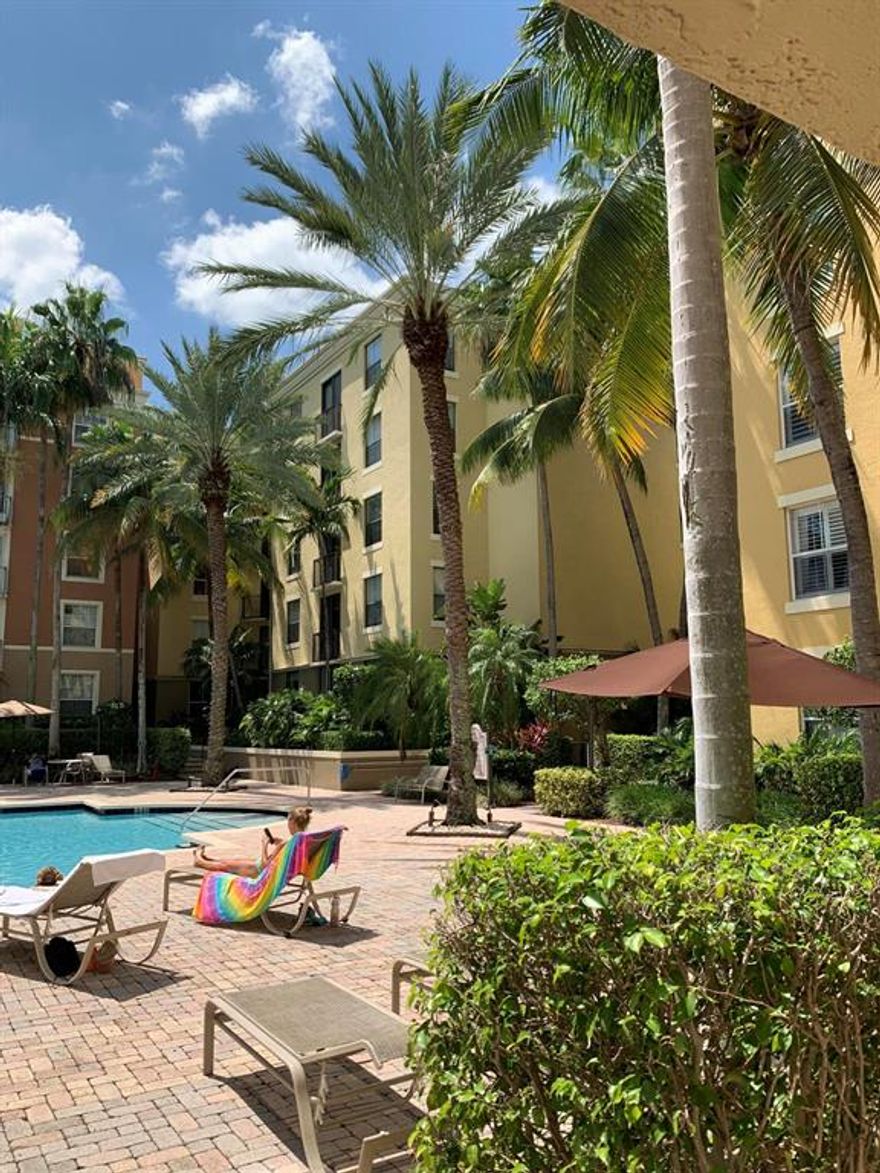 Right in the heart of West Palm. 2/2 condo completely renovated Beautiful pool view from every room. This condo has been completely redone with great attention to detail. Stainless steel appliances, impact windows, new AC with 10 year warranty (will convey to buyer), new hot water heater, new paint, new ceiling fans, granite counter-tops, tile throughout, removed popcorn ceiling. Building offers great amenities, pool, hot tub, fitness center, on site guard and gated parking. Walk to restaurants, shops, Kravis Center, Rose Mary Square and Clematis.