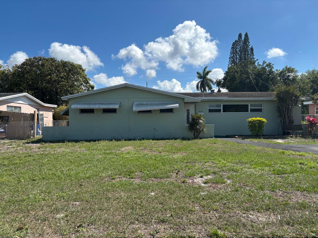 Photo of 5068 Marcia Place, West Palm Beach, FL 33407 (MLS # B26013388)