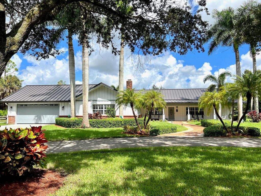 Photo of 14863 22nd Road N, Loxahatchee Groves, FL 33470 (MLS # R10923593)