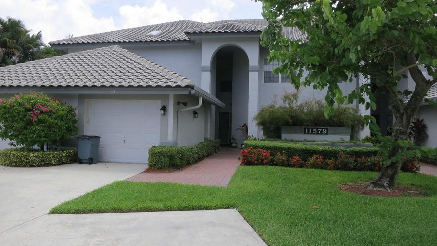 Beautifully updated 2BR/2BA condo on water. Living areas are all tiled and bedrooms have laminate for clean easy care. a/c replaced in 2017 and kitchen cabinets and granite 2 years new. Glass enclosed Florida room with remote controlled fans overlooking the tranquil water setting. Lovely decorator touches throughout. Indian Spring Association has a one time capital contribution of $992.00 due from buyer at closing.  Memberships are available at Indian Spring CC which offers 2 championship golf courses, clubhouse with fitness center and dining venues and a full country club lifestyle.