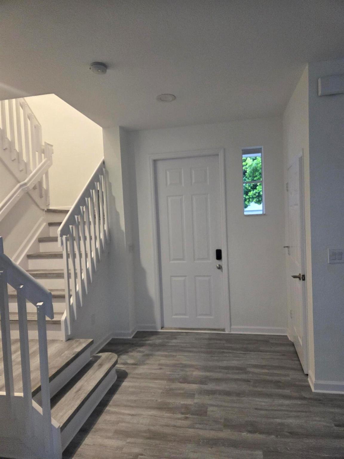 Fully renovated and move-in ready! This light-filled residence has been refreshed top to bottom, showcasing brand-new flooring throughout and a clean, modern look. The open living/dining area flows to an updated kitchen and refreshed baths with contemporary fixtures and finishes. Generously sized rooms, great storage, and a neutral palette make furnishing a breeze. All of this just minutes to Singer Island beaches, marinas, shopping, dining, and I-95--plus a quick commute to the malls and the airport. Whether a primary home, seasonal retreat, or investment, this turnkey property delivers style, comfort, and unbeatable coastal convenience. Easy to show--come see it today!
