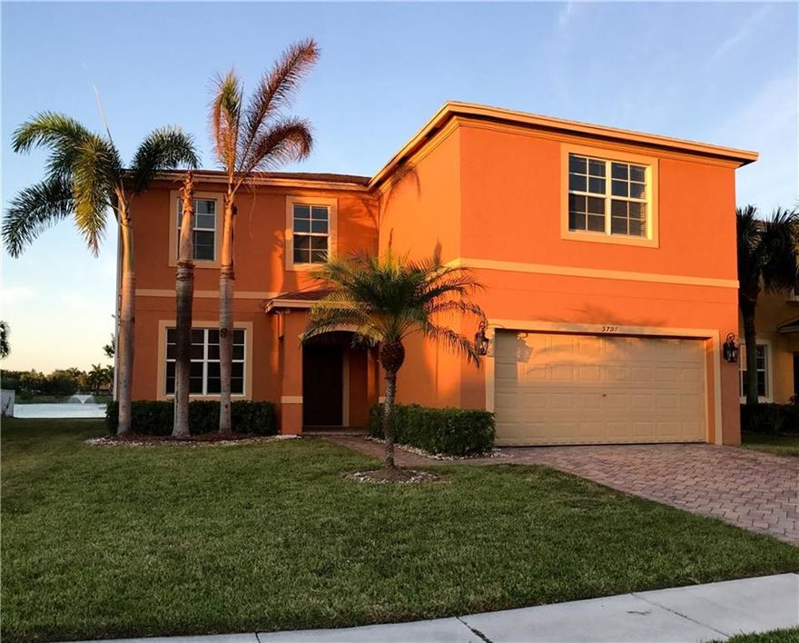 LUXURIOUS RARELY AVAILABLE 2008 6/4 HOME W/ OVER $100,000 IN UP GRADES.BEAUTIFUL VIEW OF THE LAKE & FOUNTAIN.SHINING 24x24 MARBLED & REAL WOOD FLOORING THROUGH OUT.LARGE KITCHEN UPGRADED REAL CHERRY WOOD CABINETS, GRANITE COUNTERTOPS,SS APPLIANCES.PERFECTLY DESIGNED FLOOR PLAN WITH A BEDROOM/OFFICE ON THE GROUND LEVEL, WITH A HUGE LOFT "ROOM FOR POOL TABLE,ENTERTAINING",ALL IMPACT WINDOWS & DOORS,CROWN MOLDING IN EVERY ROOM,PESTICIDE SYSTEM,ETHERNET WIRING IN EVERY ROOM,WOOD BLINDS THROUGH OUT,ETC.