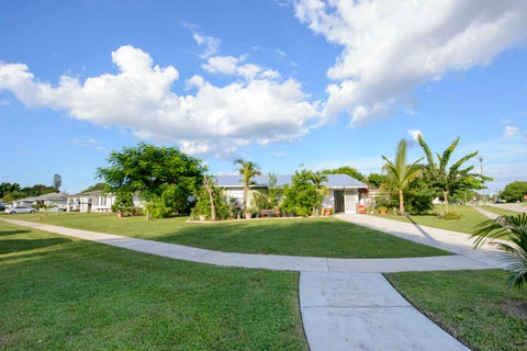 Photo of 221 SW CALMOSO Drive, Port Saint Lucie, FL 34983 (MLS # B26082371)