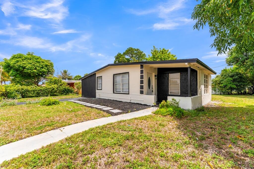 Photo of 3411 NW 5th Court, Lauderhill, FL 33311 (MLS # B26052808)