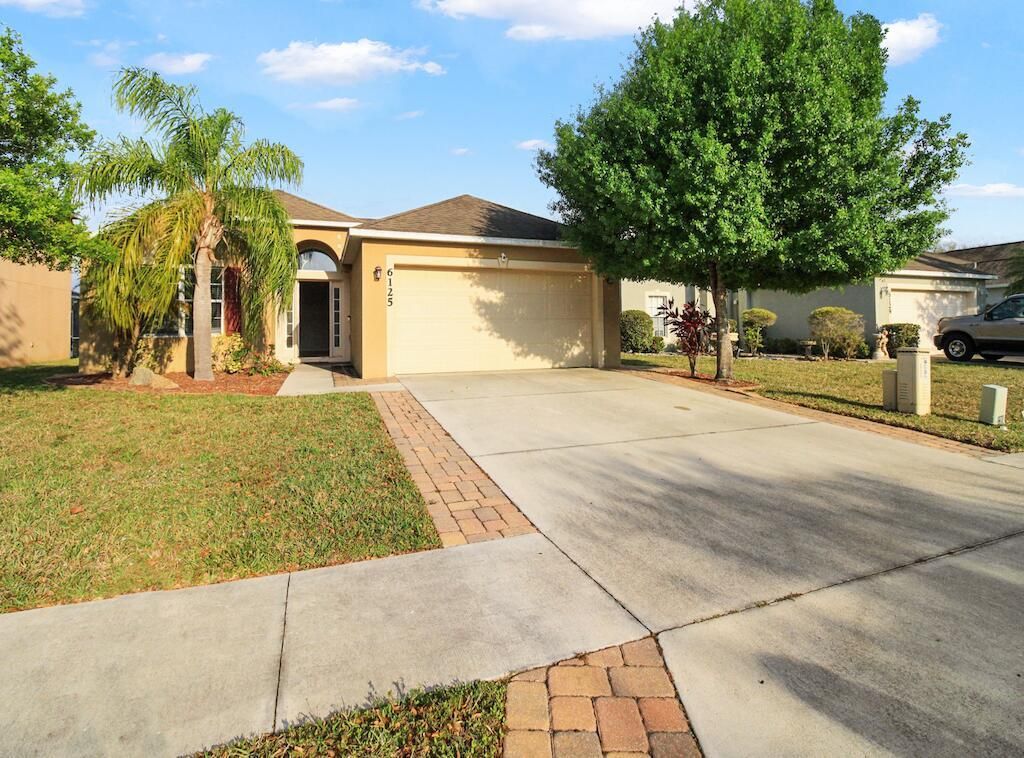 Photo of 6125 NW Wild Cotton Way, Port Saint Lucie, FL 34986 (MLS # R10954414)
