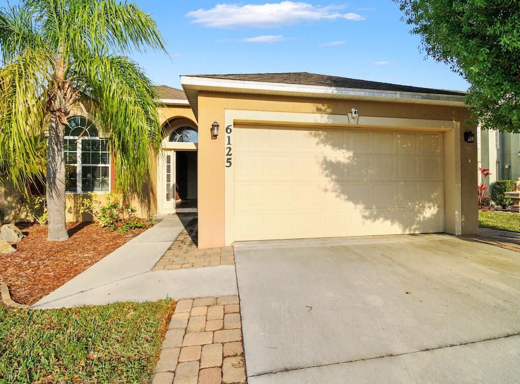 Photo of 6125 NW Wild Cotton Way, Port Saint Lucie, FL 34986 (MLS # R10954414)