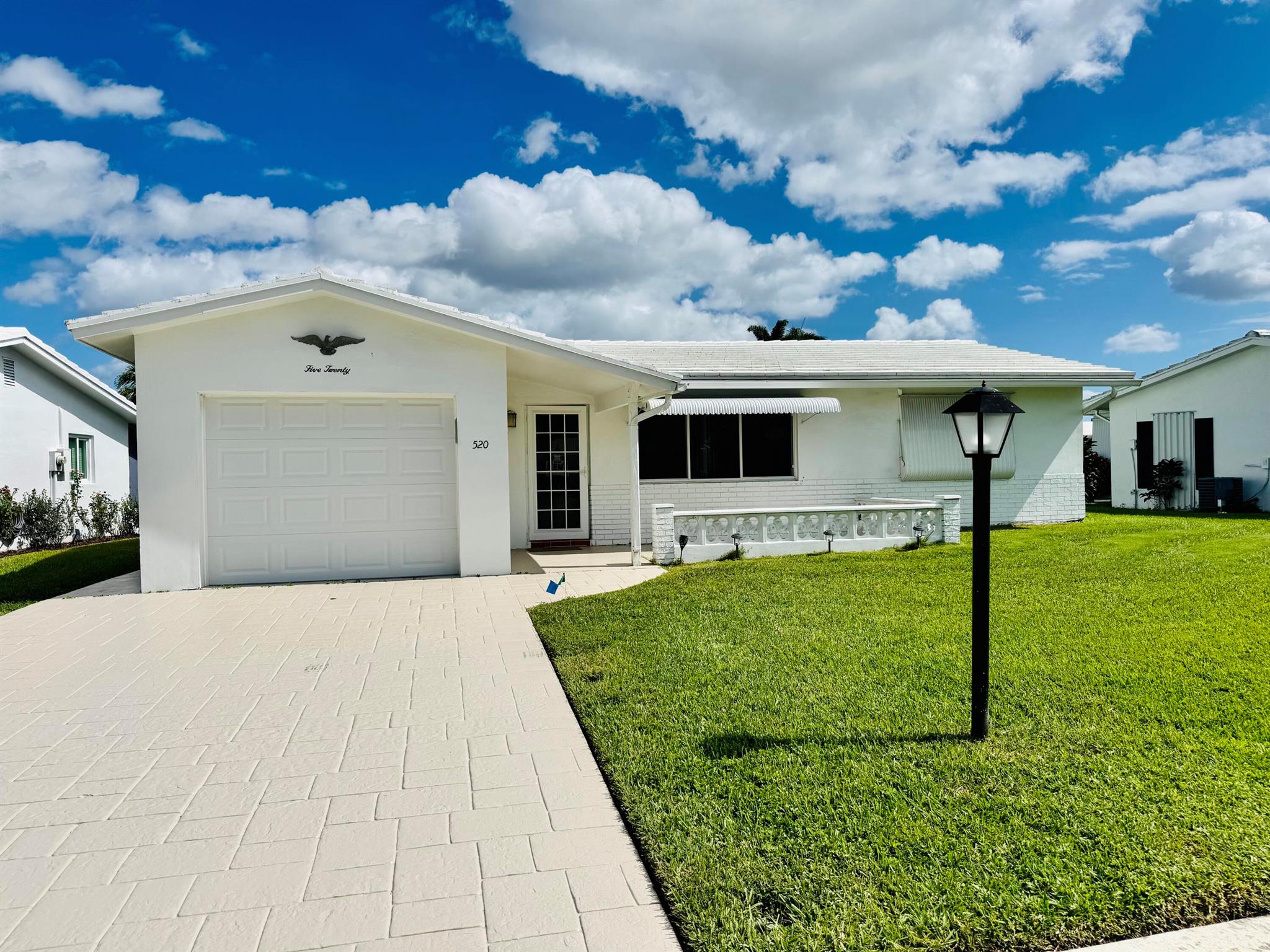 Enjoy Boynton Beach's most desirable 55+ communities! This charming home is ideally located near *Clubhouse 2*, offering convenient access to the fitness center, and a variety of social activities. Enjoy an active Florida lifestyle with golf, shuffleboard, and community events just minutes from your door.The property features a spacious layout with bright natural light, neutral finishes, and comfortable living areas perfect for relaxing or entertaining guests. The kitchen opens to the dining area, making it easy to enjoy casual meals or host family gatherings. The primary suite offers ample closet space and a private bath for comfort and privacy. Outside, the home includes a private driveway, garage and a no maintenance yard