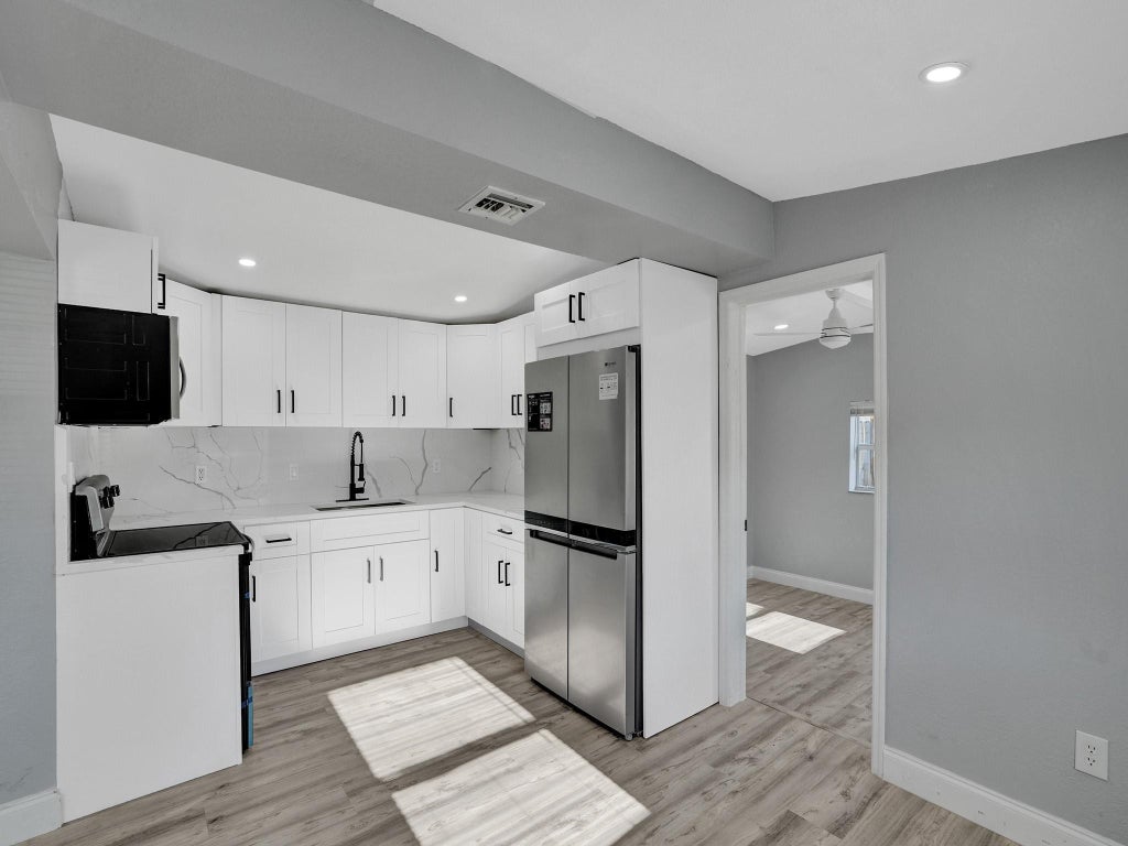 Photo of 5231 NE 19TH Terrace, Pompano Beach, FL 33064 (MLS # B26083266)