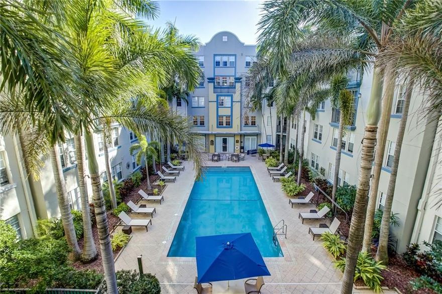 This spacious 2/2 offers a split floor plan & the largest balcony in the complex overlooking the beautiful pool area with eastern exposure and no street noise! New wood flooring, new guest bath vanity, new baseboards, fresh paint, stainless st. appl. Large walk-in closet & the master has separate shower & tub. Pet friendly building, covered parking in secure garage, 1 assigned space but second possible for a one-time fee of $1,500.  The HOA fees includes cable and internet!!! Amenities include pool, spa, fitness center, zen garden, sundeck with 360-degree views of downtown Ft Lauderdale, clubhouse etc....Building offers secure access. Flagler Village is the new "place to be" in downtown Ft Lauderdale. Best deal in downtown Ft Lauderdale for a modern condo with full amenities.