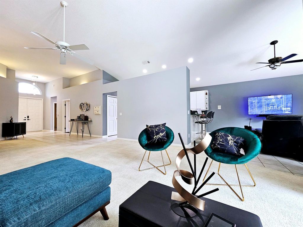 Photo of 577 SW Lake Charles Circle, Port Saint Lucie, FL 34986 (MLS # R10981660)