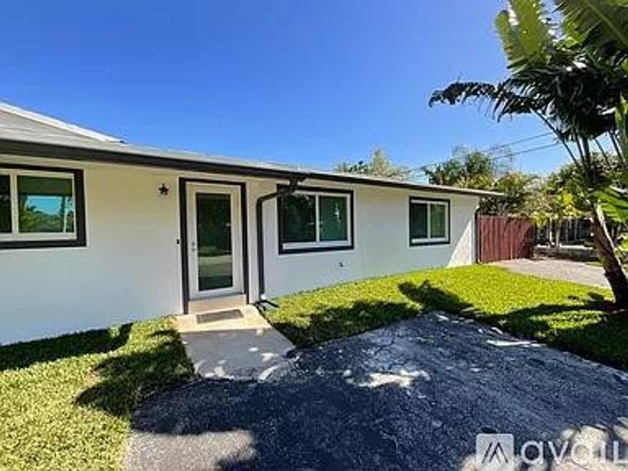 Charming Newly Remodeled Fourplex 1 Bedroom 1 Bath unit in the heart of Wilton Manors! 1 parking space included. Nestled in the most desirable area of Wilton Manors, this property provides the perfect blend of comfort and convenience. This unit boasts new laminate wood flooring, New black granite countertops, 2 New modern AC Units and abundant natural light. The updated white cabinetry kitchen features new stainless steel appliances. Newly painted and NEW 1in white cordless blinds installed on all windows. NEW hurricane impact modern windows/doors, and new grass throughout property. On-site full size Washer/Dryer. New artificial bamboo unit dividers and white fence door being installed outside courtyard. Super fast Fiber Optic internet/cable included. First Month & Security Deposit only.