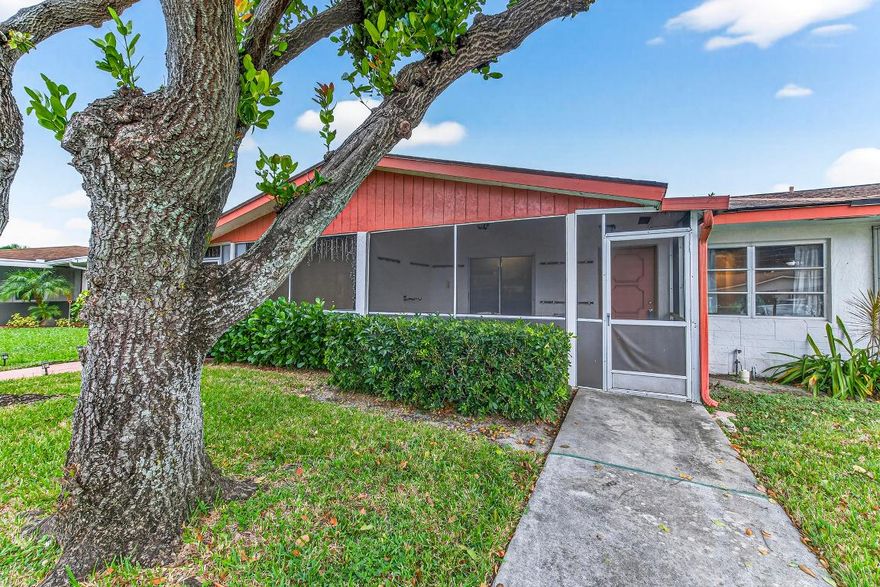 BRAND NEW ROOF!!!    Discover relaxed South Florida living in Delray Villas, a vibrant 55+ community in the heart of Delray Beach. This 2-bedroom, 2-bath villa features about 1,200 sq. ft. of comfortable living space, an enclosed front porch perfect for morning coffee, and peaceful water views. Community amenities include a pool, fitness center, pickleball, tennis, and an active clubhouse offering plenty of social activities.  Ready for your improvements and renovations.   Close to shopping, restaurants, and the beach.