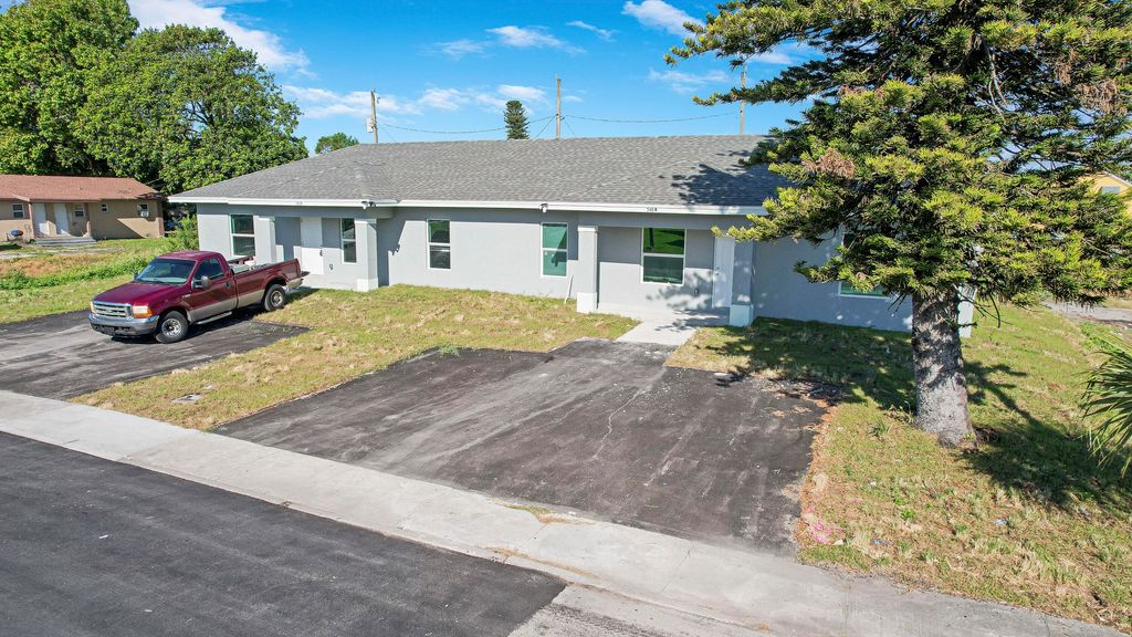 Photo of 548 SW 5th Street #B, Belle Glade, FL 33430 (MLS # R10976887)